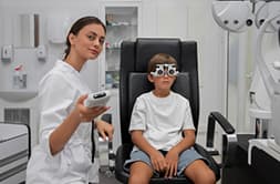 Young girl having trial lens eye checkup